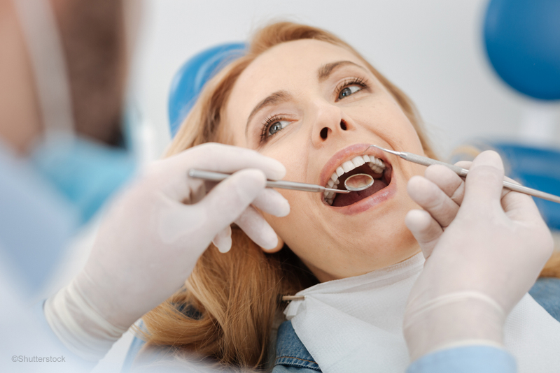 Woman getting a dental exam