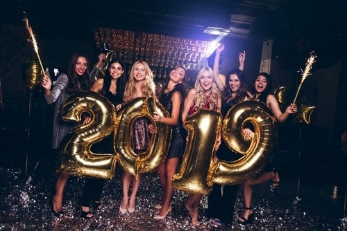 2019 new years party with people smiling